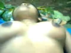 Busty black skin village playgirl having sex outdoors on webcam